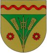 Unter goldenem Schildhaupt, darin eine rote Wellenleiste, in Gold eine gestürzte eingebogene grüne Spitze, darin wachsend eine goldene Heugabel, begleitet von zwei schrägwachsenden Ähren; vorne und hinten je eine rote Rose mit grünen Kelchblättern und goldenen Butzen.