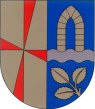Von Gold und Blau gespalten; vorne ein rotes Halbständerkreuz, hinten eine silberne Wellenleiste, darauf ein goldener, schwarzgefugter (hochgotischer) Spitzbogen, darunter aus dem Schildrand wachsend ein dreiblättriger goldener Buchenzweig.